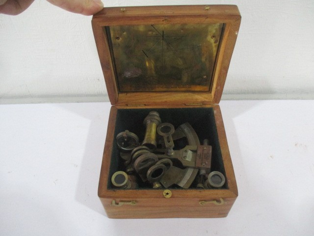 A brass sextant by Kelvin & Hughes in wooden box