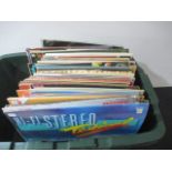 A collection of vinyl records including The Platters, Jim Reeves, Roy Orbison, Mozart, Beethoven