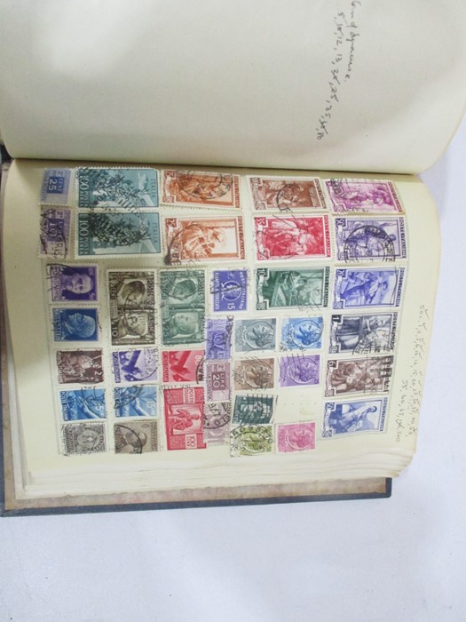 A collection of worldwide stamps along with loose stamps - Image 54 of 94