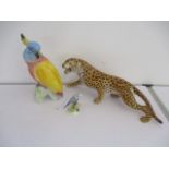 A Beswick parrot figure along with a Adderley budgie figure and a leopard