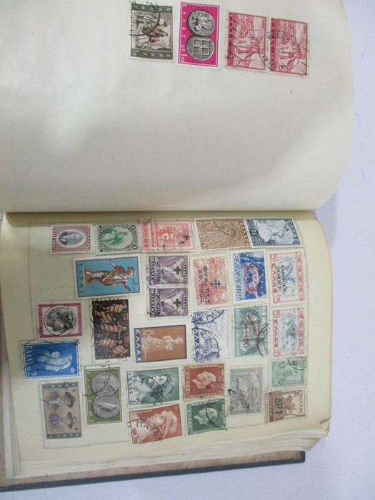 A collection of worldwide stamps along with loose stamps - Image 34 of 94