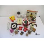A collection of novelty telephones and related items along with Wallace and Gromit radio and door