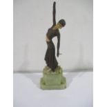 An Art Deco figure of a dancer on alabaster base (1 hand missing)
