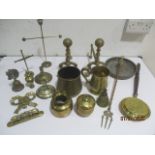 A collection of various brass items including fire dogs, tankard, miniature bed warming pan etc