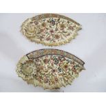 A matched pair of Fischer shaped dishes with gilt and scroll decoration- 1 A/F, other has small chip