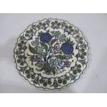 A Zsolnay charger decorated with flowers in blues and green, 32 cm diameter