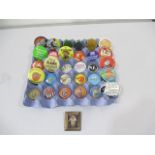 A collection of novelty badges (31)