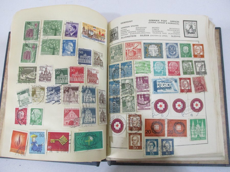 A collection of worldwide stamps along with loose stamps - Image 37 of 94