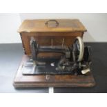 A vintage sewing machine in case