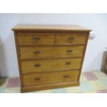 A satinwood chest of five drawers