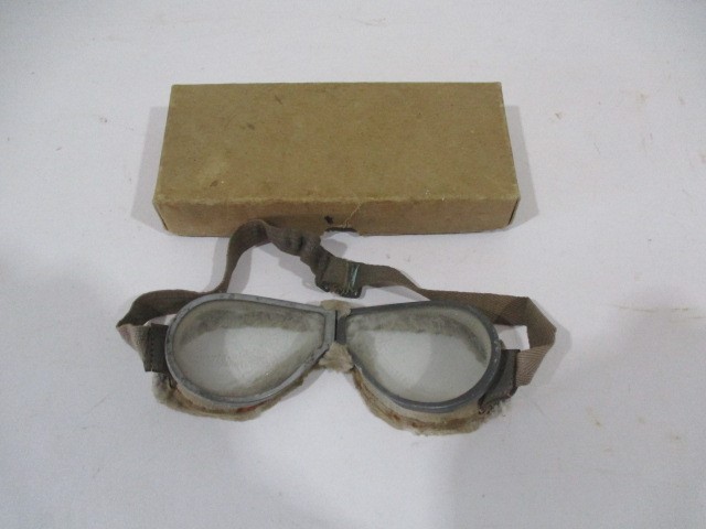 A pair of vintage motoring goggles