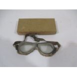 A pair of vintage motoring goggles