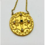 A 9 ct gold pendant ( missing back) set with seed pearls and a sapphire on integral chain, 6.2g