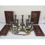 A collection of various candlesticks,carved panels etc.