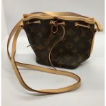 A Louis Vuitton small shoulder bag, number AR5125 with dust cover