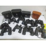A collection of nine pairs of binoculars including Glider, Saratoga Swift, Scheffel etc