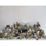 A large collection of owl ornaments etc.