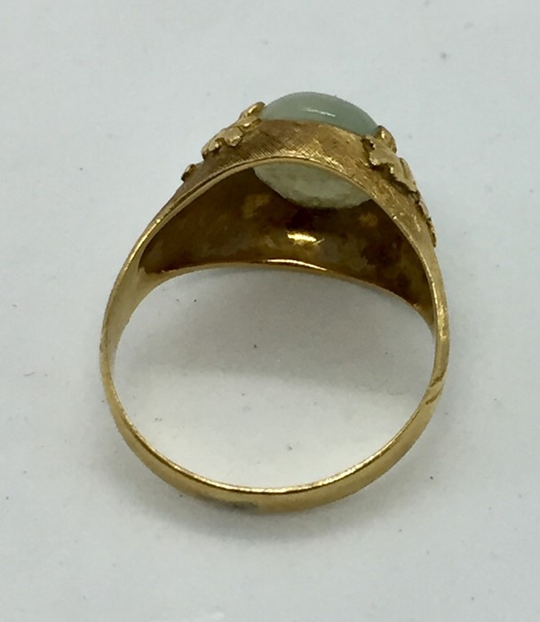A gold ( hallmark badly rubbed) ring set with jade - Image 3 of 3