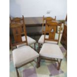 A "Brights of Nettlebed" Oak refrectory extendable dining table with four chairs