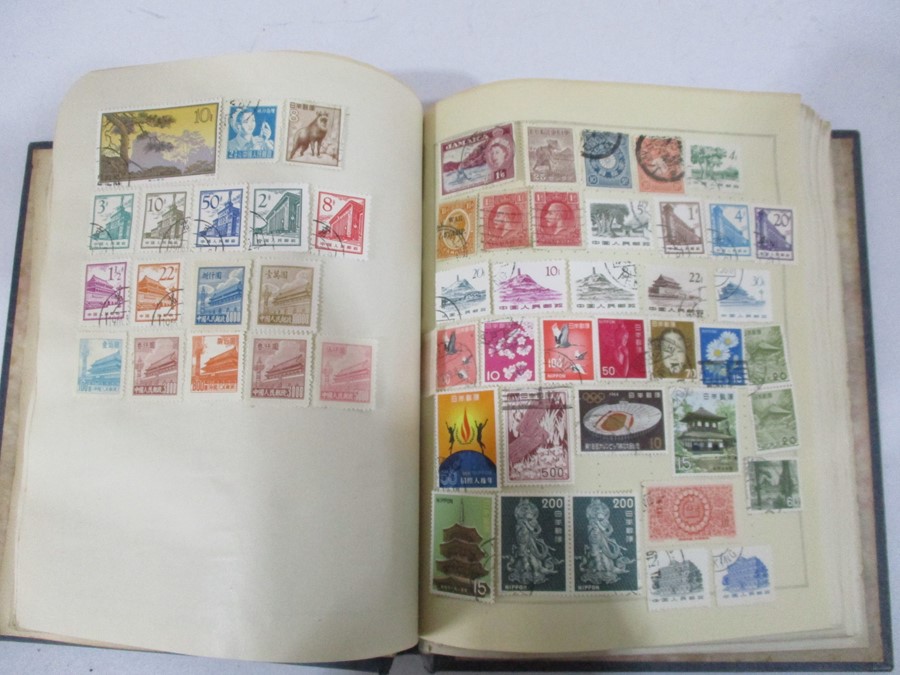 A collection of worldwide stamps along with loose stamps - Image 57 of 94