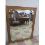 A large pine mirror with leaded light features