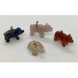 Four animal charms ( 3 pigs and a tortoise) carved from Lapis, quartz etc.