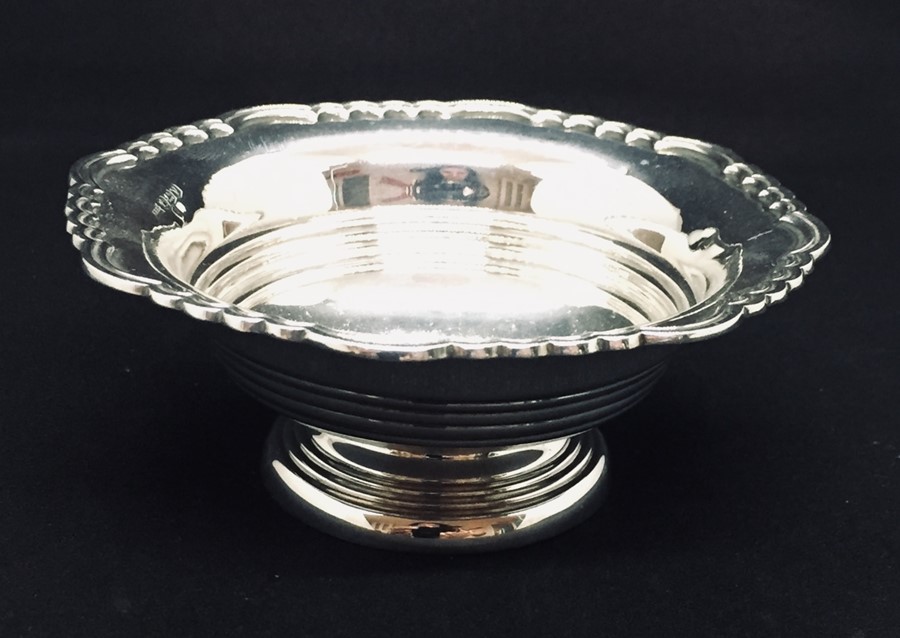 A hallmarked silver footed dish by Walker & Hall