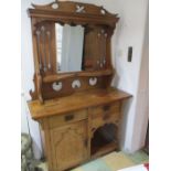 A oak art nouveau mirrored sideboard