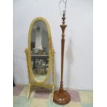 A beech cheval mirror along with a vintage standard lamp