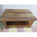 A rectangular rustic coffee table