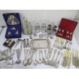 A collection of silver plated items and cutlery