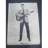 A vintage French magazine poster of Elvis Presley playing guitar, 124 cm x 90 cm
