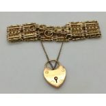 A fancy 9 ct gold gate bracelet with padlock, 19.4g