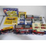 A collection of boxed diecast cars including Dinky, Corgi, Lledo etc