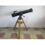 A Tasco 302013 telescope with accessories