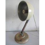A Sunco industrial style heat lamp