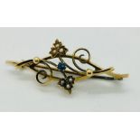 A 15ct gold brooch set with seed pearls. Weight 3.2g