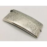 A hallmarked silver curved card case.