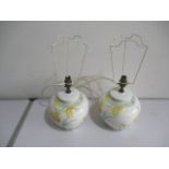 A pair of table lamps decorated with tulips by Saville E J LTD