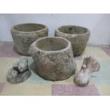 Three concrete garden pots along with two animal figures