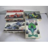Four boxed Tamiya model kits including Lotus 25, Ferrari F1 2000, Jordan 191 and Williams F1 BMW F24