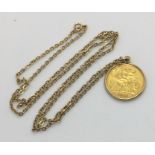 A 1914 half sovereign in gold mount with 9 ct gold chain, total weight 8.8g