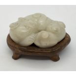 A white jade 'cat and kitten' group. 5.3cm