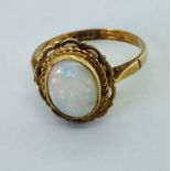 A 9 ct gold ring set with an opal, size M 1/2