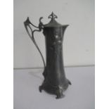 An Art Nouvea pewter WMF claret jug