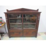 A Victorian display cabinet