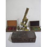 An Adie & Sons brass microscope along with three cases of microscope slides ( some named)