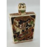 A late 19th century carved ivory scent bottle decorated with dragons