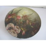 A Belleek pottery charger with hand painted floral scene, 41.5cm diameter