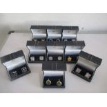 Nine pairs of boxed Claire Garnett contemporary cufflinks